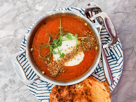 A bowl of warming tomato soup in winter